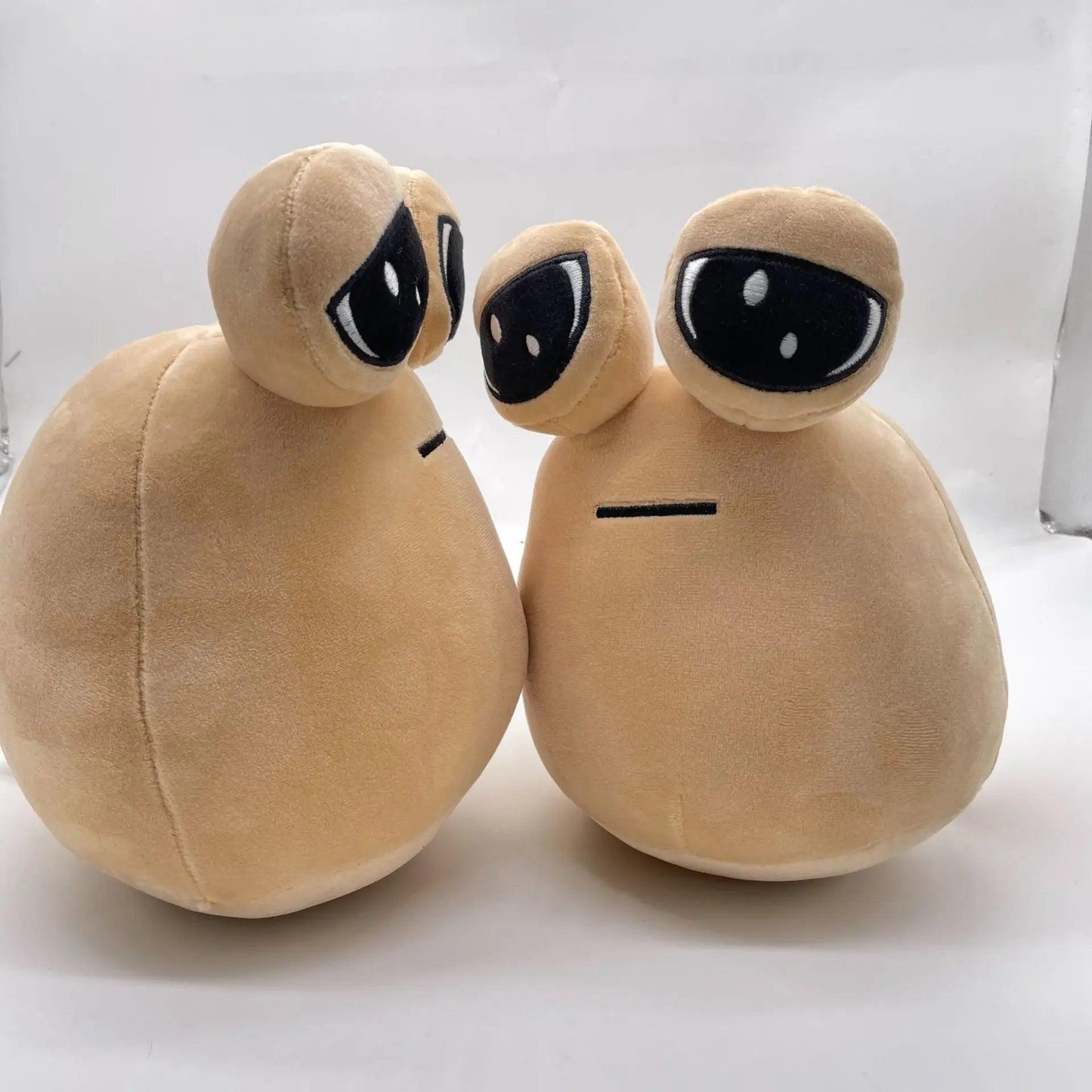 Pelúcia Pou triste - The Midnight Geek