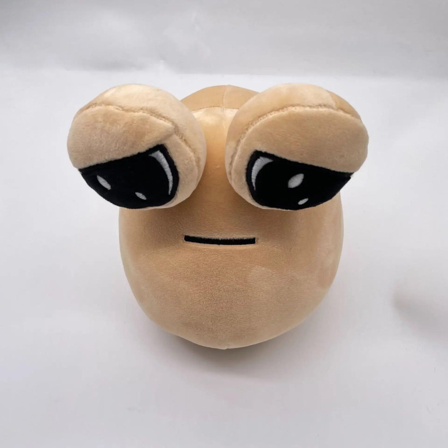 Pelúcia Pou triste - The Midnight Geek